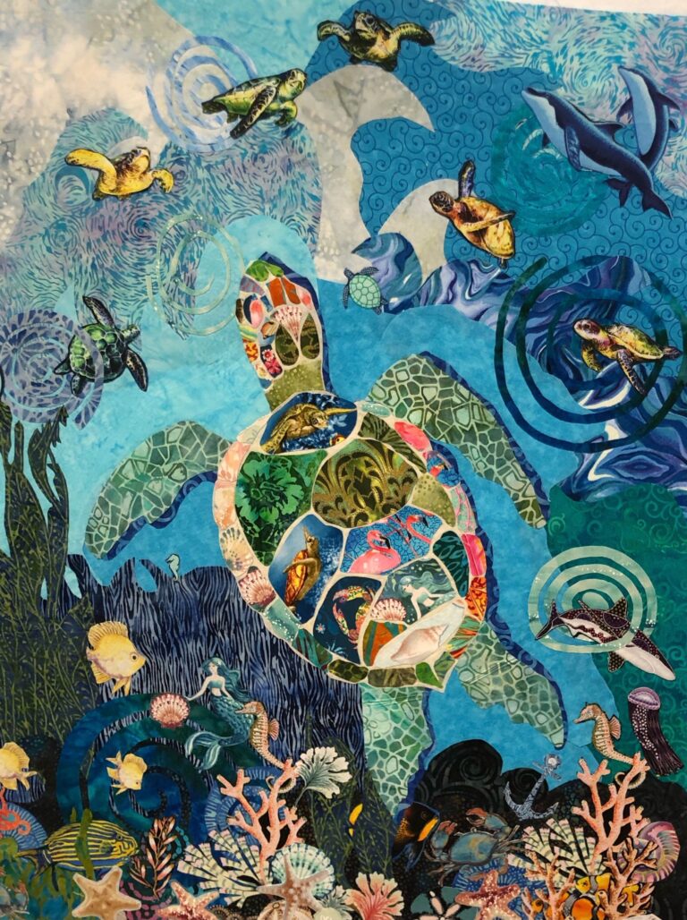 Textile Collage by Fiber Artist McFetters Caldwell. Collage of fabric depicting an underwater scene.